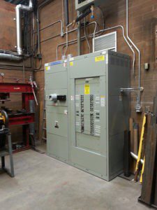 A large electrical panel in an industrial setting.